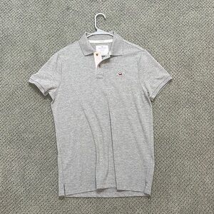 A grey large hollister polo